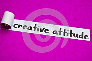 Creative Attitude text, Inspiration, Motivation and business concept on purple torn paper