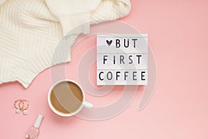 Creative autumn flat lay overhead top view coffee cup vintage lightbox But coffee first text on millennial pink background copy