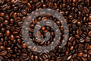Creative backdrop made of coffee beans. Love coffee concept