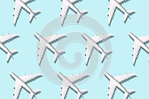 Creative banner of white planes on blue background. Travel, vacation concept. Travel, vacation ban. Flights cancelled and resumed