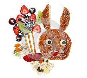 Creative breakfast with fruit and sweet nutella on bread