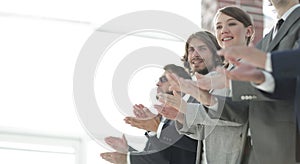 Creative business team applauding