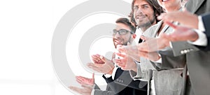 Creative business team applauding in officce