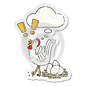 A creative cartoon chicken laying egg and thought bubble as a distressed worn sticker