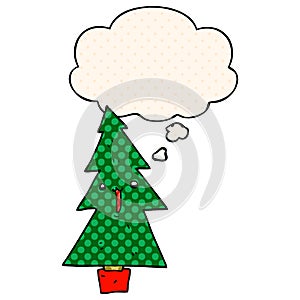 A creative cartoon christmas tree and thought bubble in comic book style