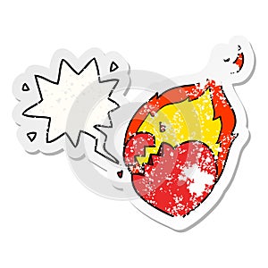 A creative cartoon flaming heart and speech bubble distressed sticker