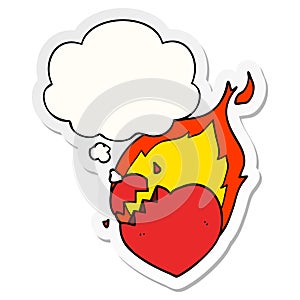 A creative cartoon flaming heart and thought bubble as a printed sticker