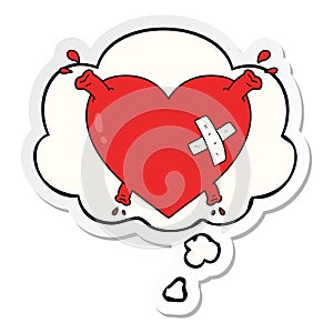 A creative cartoon heart squirting blood and thought bubble as a printed sticker