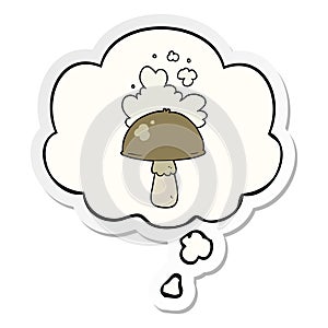 A creative cartoon mushroom with spore cloud and thought bubble as a printed sticker
