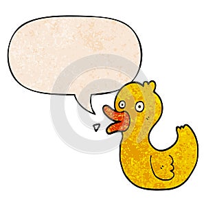 A creative cartoon quacking duck and speech bubble in retro texture style