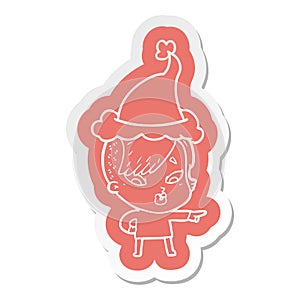 A creative cartoon  sticker of a surprised girl pointing wearing santa hat