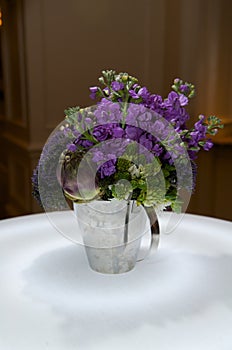 Creative centerpiece with vegetables and foliage