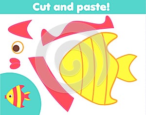 Creative children educational game. Paper cut and paste activity. Make a tropic fish with glue and scissors