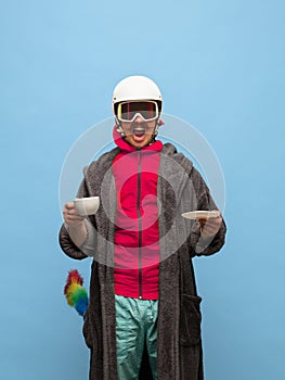Creative collage of cropped images of young man in home clothes and sportswear, with coffee and pipidastre
