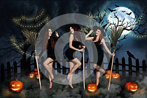 Creative collage portrait of three smiling conjurer girls wear cone hat hold broom stick isolated on frightening forest