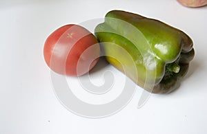 Creative combination of tomato and green pepper