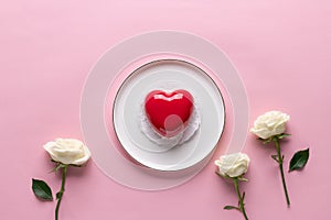 Creative composition with red heart cake and white flowers