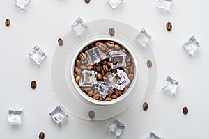 Creative concept of iced coffee on a gray background. Top view