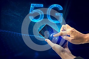 Creative connection background, mobile phone with 5G hologram on the background of the new world era, the concept of 5G network,