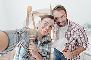 Creative couple renovating their house photo