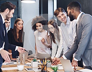 Creative coworkers working with new startup project