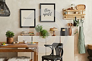 Creative and cozy kitchen interior composition with mock up poster frames, beige commode, plants, chair, family table.