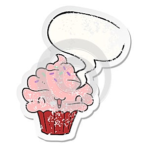 A creative cute cartoon frosted cupcake and speech bubble distressed sticker