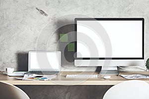 Creative designer desktop with white devices