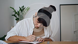 Creative designer drawing pen at studio close up. Talented woman using ruler