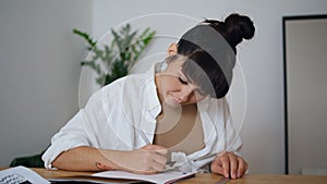Creative designer drawing pen at studio close up. Talented woman using ruler
