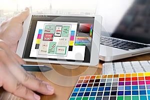 Creative Designer Graphic at work. Color swatch samples, Illustrator Graphic designer working digital tablet and computer