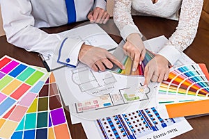 Creative designers choosing colors for dining room