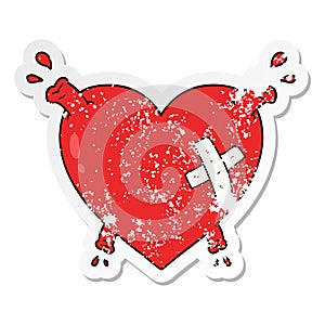 A creative distressed sticker of a cartoon heart squirting blood