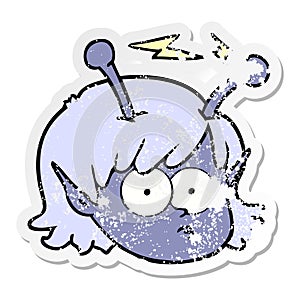 A creative distressed sticker of a cartoon telepathic alien space girl face photo