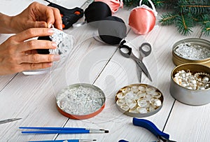 Creative diy craft hobby. Handmade christmas decoration, balls and garland