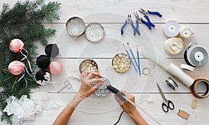 Creative diy hobby. Handmade christmas decoration, balls and garland