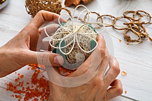 Creative diy hobby. Handmade craft christmas decoration, balls and garland