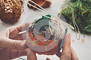 Creative diy hobby. Handmade craft christmas decoration, balls and garland