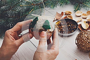 Creative diy hobby. Handmade craft christmas decoration, balls and garland