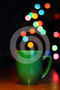 Creative effect cup. As if bokeh circles fly out of it.