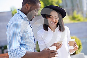 Creative excited lady haring something interesting with her boyfriend