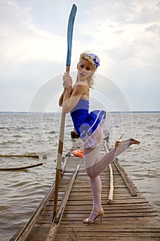 Creative Fine Art Portrait Of A Young Beautiful Woman On A Boat