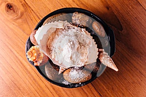 Creative Fine Dining: Crab mix with snow flake that made from macadamia, hoseradish and dashi-junsai served in crab shell.