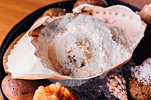 Creative Fine Dining: Crab mix with snow flake that made from macadamia, hoseradish and dashi-junsai served in crab shell.