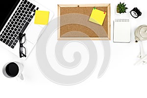 Creative flat lay photo of modern workplace with laptop, top view laptop background and copy space on white background, Above view