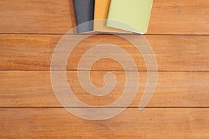 Creative flat lay photo of workspace desk. Office desk wooden table background with mock up notebooks.