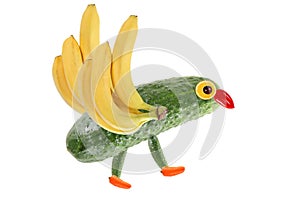 Creative food concept. Funny little bird made of fruits and vegetables