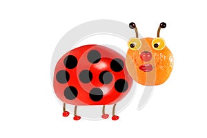 Creative food concept. Funny little ladybird made from fruit an