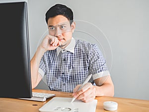 Creative freelance man on his desk.