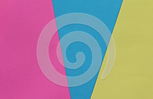 Creative geometric paper background. Pink, blue, yellow colors.